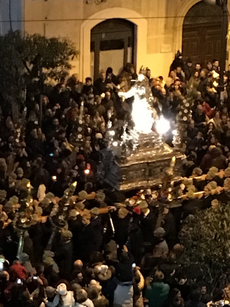 The procession passes our apartment